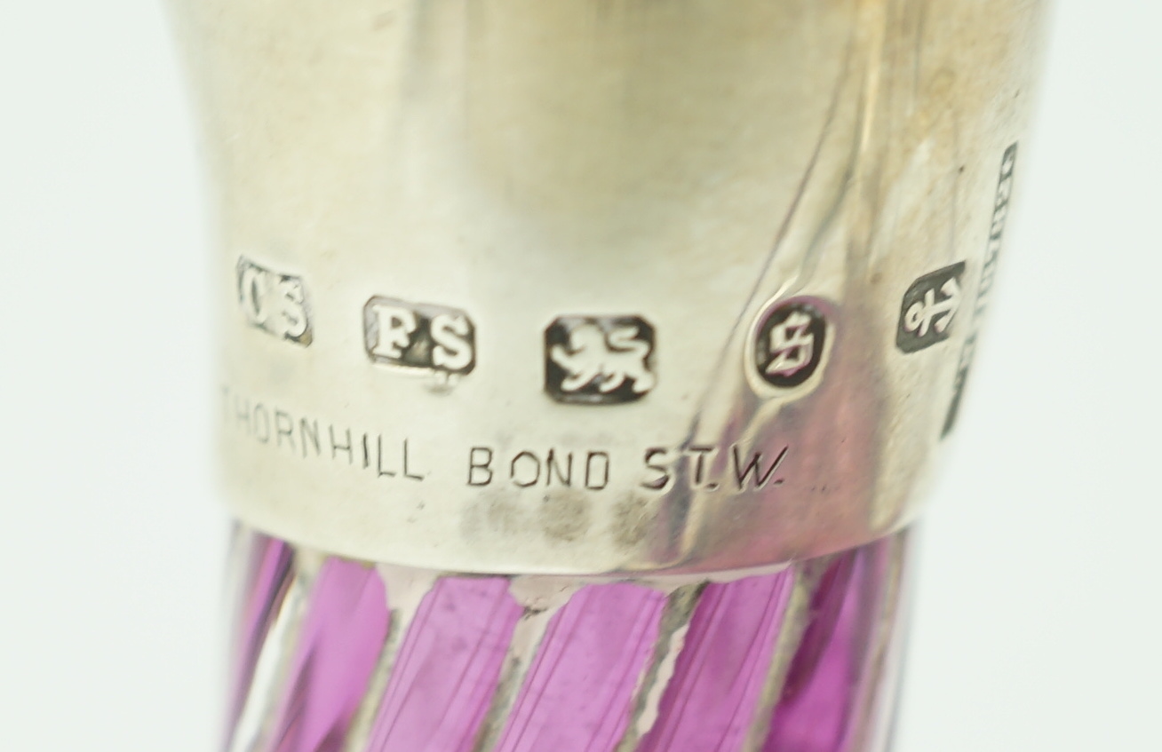 A late Victorian novelty silver mounted amethyst coloured glass liqueur jug, modelled as a duck, by Saunders & Shepherd, retailed by Thornhill